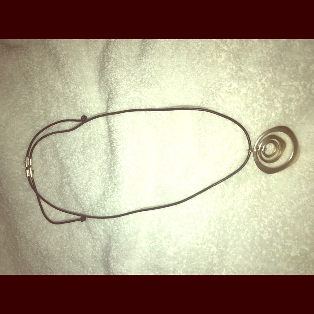 Black cord necklace with silver dangle charm